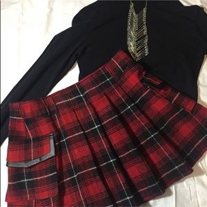 Red plaid with leather pockets. Worn once!